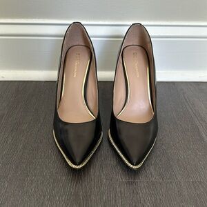 BCBGeneration point toe heels with gold trim